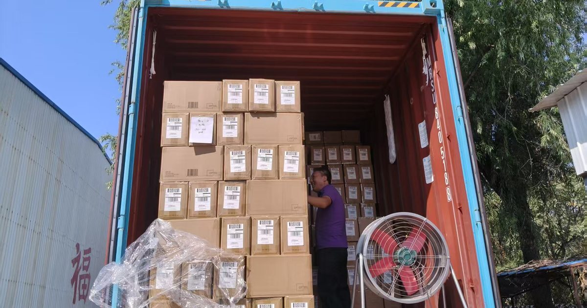 Cartons stacked and labelled inside a container during loading in China